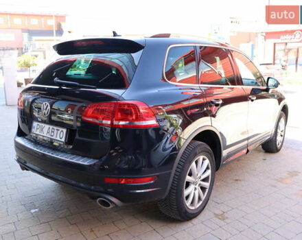 Черный Фольксваген Туарег, объемом двигателя 3 л и пробегом 142 тыс. км за 22900 $, фото 2 на Automoto.ua