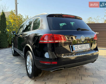 Фольксваген Туарег 2013 в Черновцах на Automoto.ua Черный Фольксваген Туарег, объемом двигателя 2.97 л и пробегом 276 тыс. км за 18900 $, фото 9 на Automoto.ua