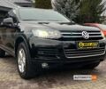 Чорний Фольксваген Туарег, об'ємом двигуна 3 л та пробігом 191 тис. км за 25300 $, фото 1 на Automoto.ua