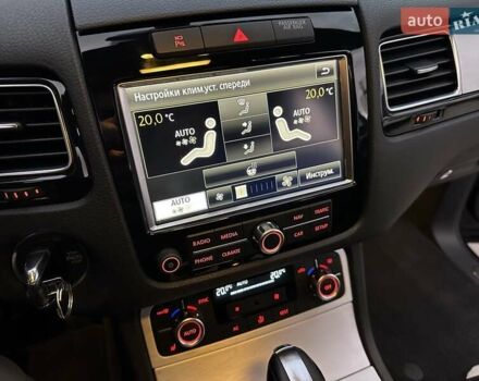 Фольксваген Туарег 2013 в Луцке на Automoto.ua Черный Фольксваген Туарег, объемом двигателя 2.97 л и пробегом 227 тыс. км за 22900 $, фото 24 на Automoto.ua