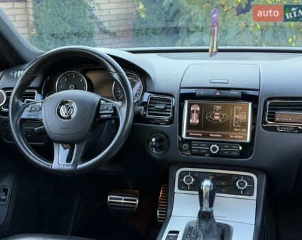 Фольксваген Туарег 2013 в Черновцах на Automoto.ua Черный Фольксваген Туарег, объемом двигателя 2.97 л и пробегом 276 тыс. км за 18900 $, фото 56 на Automoto.ua