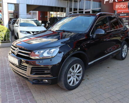 Черный Фольксваген Туарег, объемом двигателя 3 л и пробегом 142 тыс. км за 22900 $, фото 1 на Automoto.ua