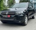Чорний Фольксваген Туарег, об'ємом двигуна 3 л та пробігом 197 тис. км за 27490 $, фото 1 на Automoto.ua