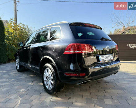 Фольксваген Туарег 2013 в Черновцах на Automoto.ua Черный Фольксваген Туарег, объемом двигателя 2.97 л и пробегом 276 тыс. км за 18900 $, фото 26 на Automoto.ua