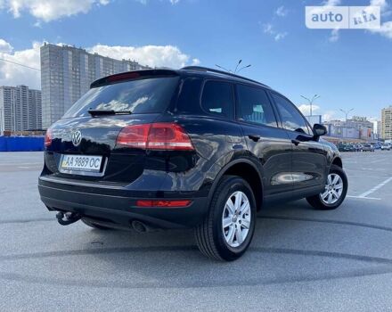 Черный Фольксваген Туарег, объемом двигателя 3 л и пробегом 223 тыс. км за 25500 $, фото 1 на Automoto.ua