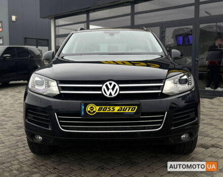 Чорний Фольксваген Туарег, об'ємом двигуна 3 л та пробігом 272 тис. км за 22990 $, фото 1 на Automoto.ua