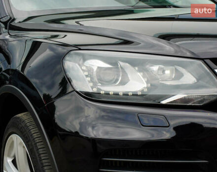 Черный Фольксваген Туарег, объемом двигателя 3 л и пробегом 236 тыс. км за 24999 $, фото 1 на Automoto.ua