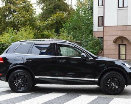 Черный Фольксваген Туарег, объемом двигателя 3 л и пробегом 256 тыс. км за 18900 $, фото 3 на Automoto.ua