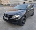 Черный Фольксваген Туарег, объемом двигателя 3 л и пробегом 305 тыс. км за 21700 $, фото 1 на Automoto.ua