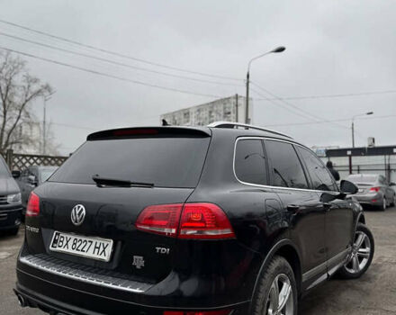 Черный Фольксваген Туарег, объемом двигателя 2.97 л и пробегом 200 тыс. км за 16000 $, фото 1 на Automoto.ua