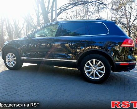 Чорний Фольксваген Туарег, об'ємом двигуна 3 л та пробігом 172 тис. км за 30999 $, фото 4 на Automoto.ua
