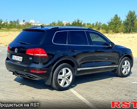 Черный Фольксваген Туарег, объемом двигателя 3 л и пробегом 184 тыс. км за 21800 $, фото 2 на Automoto.ua