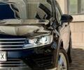 Черный Фольксваген Туарег, объемом двигателя 3 л и пробегом 216 тыс. км за 27400 $, фото 2 на Automoto.ua