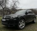 Черный Фольксваген Туарег, объемом двигателя 3 л и пробегом 250 тыс. км за 25000 $, фото 1 на Automoto.ua