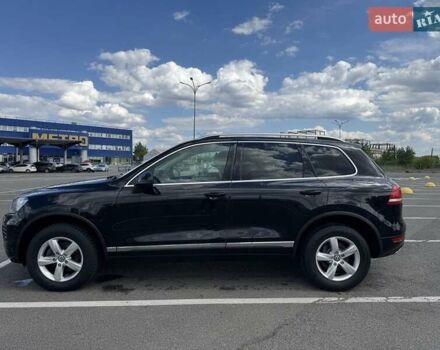 Чорний Фольксваген Туарег, об'ємом двигуна 3 л та пробігом 195 тис. км за 20950 $, фото 1 на Automoto.ua
