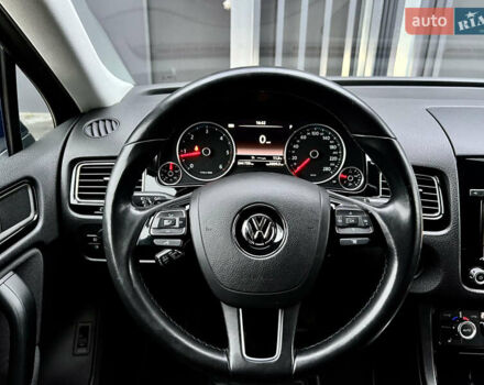 Черный Фольксваген Туарег, объемом двигателя 3 л и пробегом 245 тыс. км за 19500 $, фото 1 на Automoto.ua