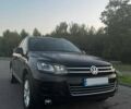Черный Фольксваген Туарег, объемом двигателя 3 л и пробегом 221 тыс. км за 24516 $, фото 1 на Automoto.ua