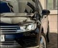 Черный Фольксваген Туарег, объемом двигателя 2.97 л и пробегом 218 тыс. км за 27200 $, фото 1 на Automoto.ua