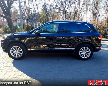 Чорний Фольксваген Туарег, об'ємом двигуна 3 л та пробігом 172 тис. км за 30999 $, фото 1 на Automoto.ua