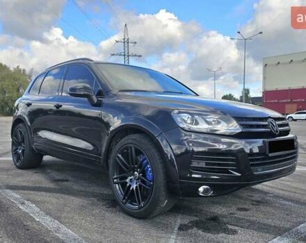 Черный Фольксваген Туарег, объемом двигателя 4.13 л и пробегом 335 тыс. км за 21500 $, фото 6 на Automoto.ua