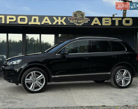 Чорний Фольксваген Туарег, об'ємом двигуна 3 л та пробігом 289 тис. км за 24900 $, фото 1 на Automoto.ua