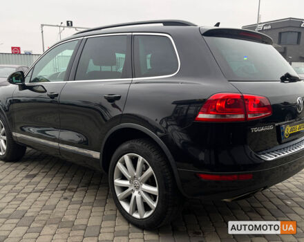 Чорний Фольксваген Туарег, об'ємом двигуна 3 л та пробігом 272 тис. км за 22990 $, фото 4 на Automoto.ua