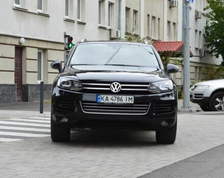 Черный Фольксваген Туарег, объемом двигателя 3 л и пробегом 256 тыс. км за 18900 $, фото 1 на Automoto.ua