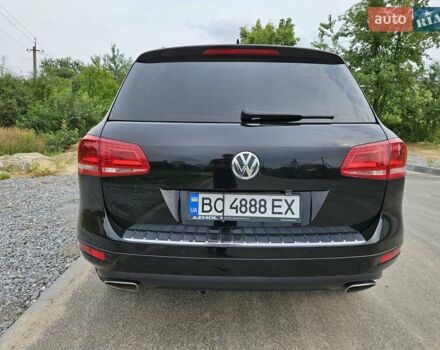 Черный Фольксваген Туарег, объемом двигателя 3 л и пробегом 236 тыс. км за 21600 $, фото 1 на Automoto.ua