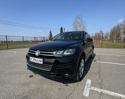 Черный Фольксваген Туарег, объемом двигателя 2.97 л и пробегом 257 тыс. км за 24000 $, фото 2 на Automoto.ua