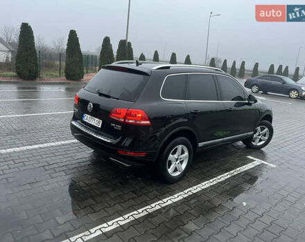 Черный Фольксваген Туарег, объемом двигателя 3 л и пробегом 265 тыс. км за 21500 $, фото 1 на Automoto.ua