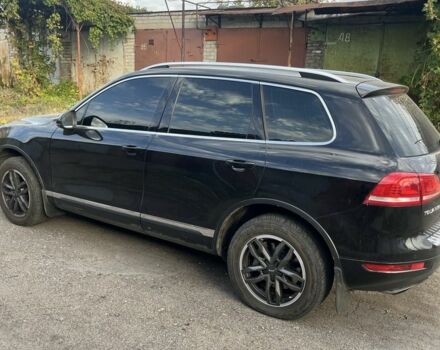 Черный Фольксваген Туарег, объемом двигателя 3 л и пробегом 258 тыс. км за 19000 $, фото 2 на Automoto.ua