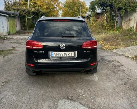Черный Фольксваген Туарег, объемом двигателя 3 л и пробегом 258 тыс. км за 19000 $, фото 1 на Automoto.ua