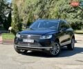 Черный Фольксваген Туарег, объемом двигателя 3 л и пробегом 215 тыс. км за 25800 $, фото 1 на Automoto.ua
