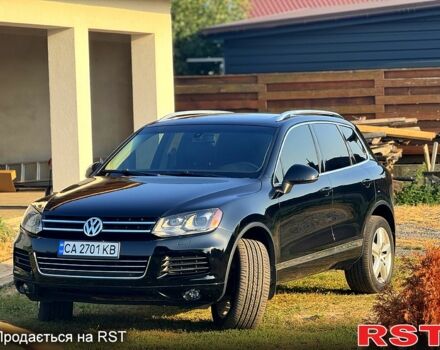 Черный Фольксваген Туарег, объемом двигателя 3 л и пробегом 184 тыс. км за 21800 $, фото 1 на Automoto.ua