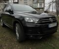 Черный Фольксваген Туарег, объемом двигателя 3 л и пробегом 250 тыс. км за 25000 $, фото 2 на Automoto.ua
