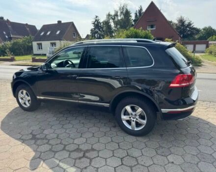 Чорний Фольксваген Туарег, об'ємом двигуна 3 л та пробігом 74 тис. км за 7000 $, фото 4 на Automoto.ua