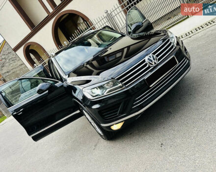 Черный Фольксваген Туарег, объемом двигателя 3 л и пробегом 286 тыс. км за 19900 $, фото 1 на Automoto.ua