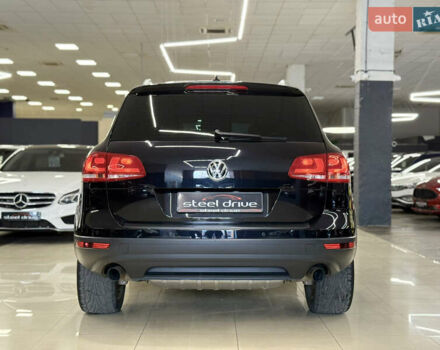Черный Фольксваген Туарег, объемом двигателя 3 л и пробегом 258 тыс. км за 24799 $, фото 3 на Automoto.ua