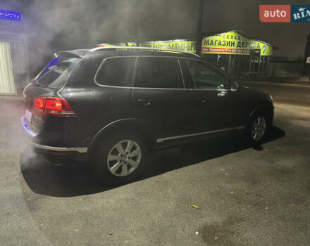 Черный Фольксваген Туарег, объемом двигателя 2.97 л и пробегом 235 тыс. км за 23500 $, фото 19 на Automoto.ua