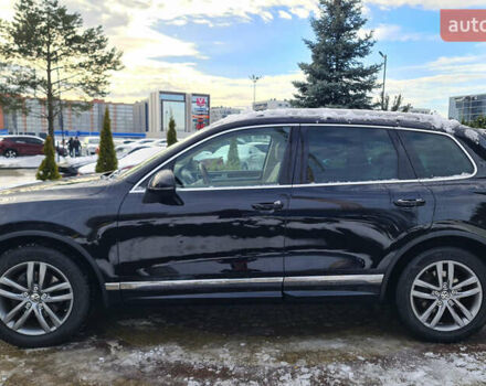 Чорний Фольксваген Туарег, об'ємом двигуна 3 л та пробігом 185 тис. км за 32999 $, фото 1 на Automoto.ua