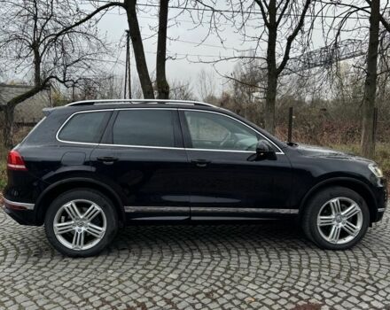 Чорний Фольксваген Туарег, об'ємом двигуна 3 л та пробігом 275 тис. км за 26000 $, фото 2 на Automoto.ua