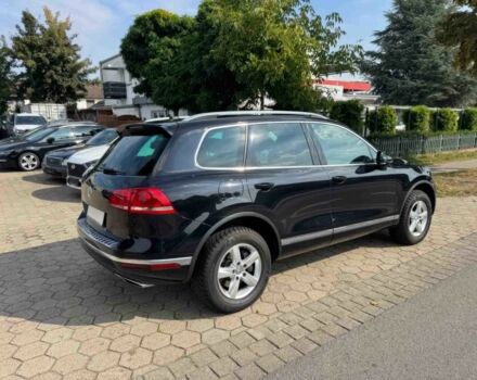 Чорний Фольксваген Туарег, об'ємом двигуна 3 л та пробігом 74 тис. км за 7000 $, фото 6 на Automoto.ua