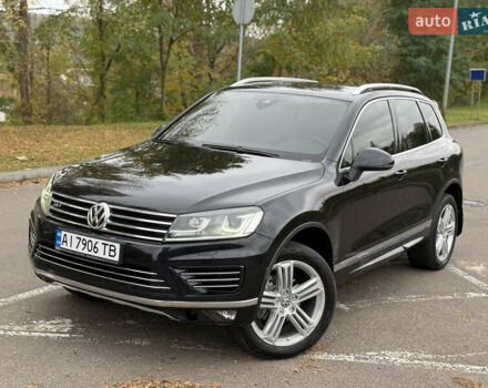 Черный Фольксваген Туарег, объемом двигателя 3 л и пробегом 237 тыс. км за 24900 $, фото 1 на Automoto.ua