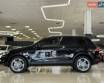 Черный Фольксваген Туарег, объемом двигателя 3 л и пробегом 258 тыс. км за 24799 $, фото 1 на Automoto.ua