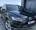Черный Фольксваген Туарег, объемом двигателя 3 л и пробегом 266 тыс. км за 27990 $, фото 1 на Automoto.ua
