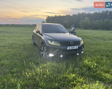 Черный Фольксваген Туарег, объемом двигателя 3 л и пробегом 230 тыс. км за 26000 $, фото 1 на Automoto.ua