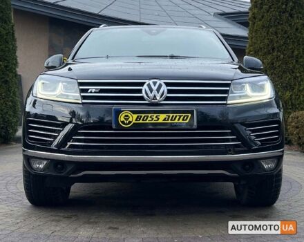 Черный Фольксваген Туарег, объемом двигателя 3 л и пробегом 212 тыс. км за 31590 $, фото 1 на Automoto.ua
