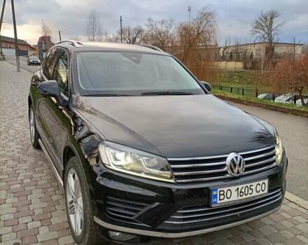 Черный Фольксваген Туарег, объемом двигателя 3 л и пробегом 204 тыс. км за 26500 $, фото 1 на Automoto.ua