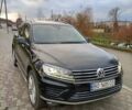 Черный Фольксваген Туарег, объемом двигателя 3 л и пробегом 204 тыс. км за 26500 $, фото 1 на Automoto.ua