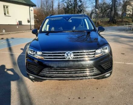 Черный Фольксваген Туарег, объемом двигателя 3 л и пробегом 76 тыс. км за 9300 $, фото 1 на Automoto.ua